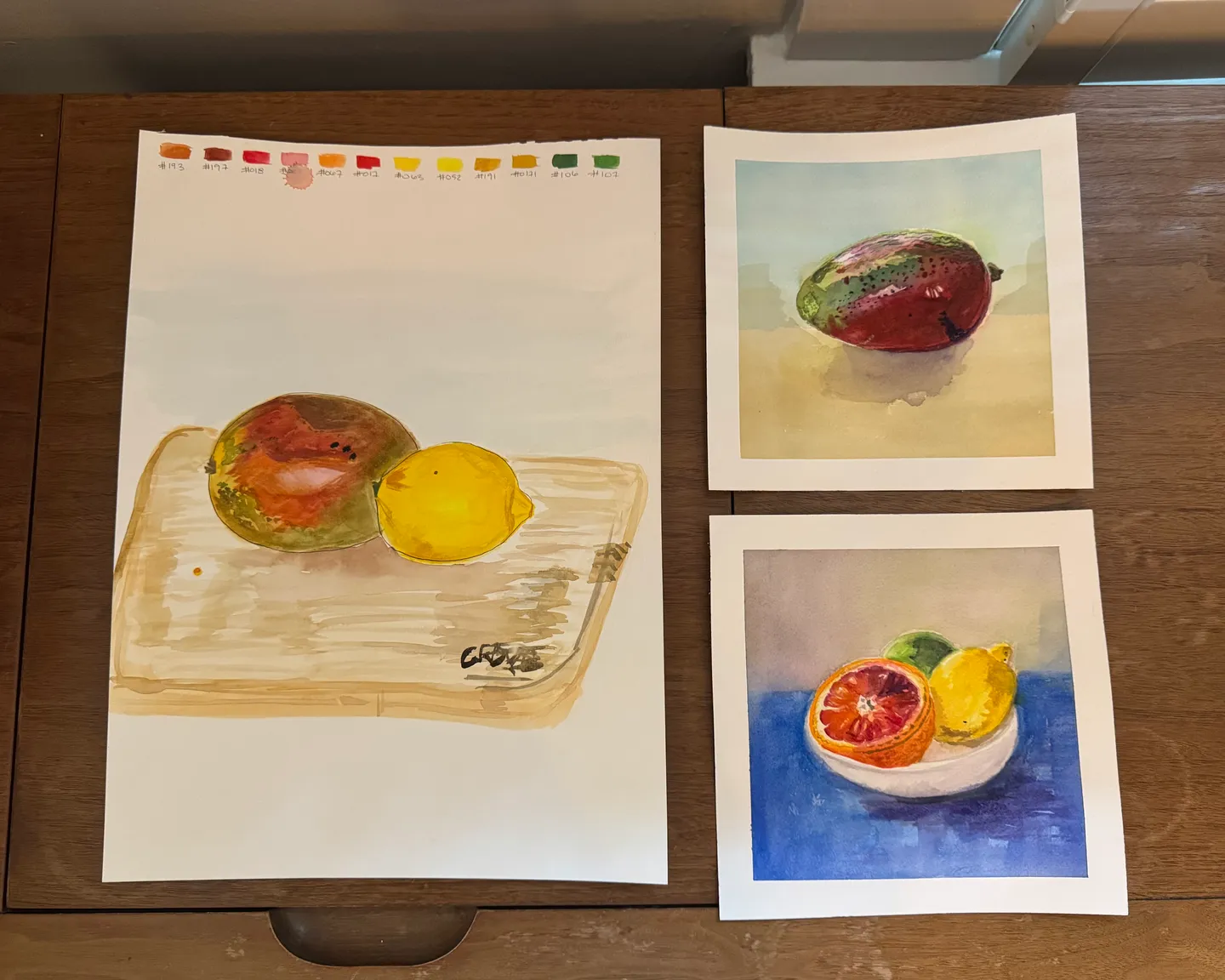 Paintings featuring mangos and citrus